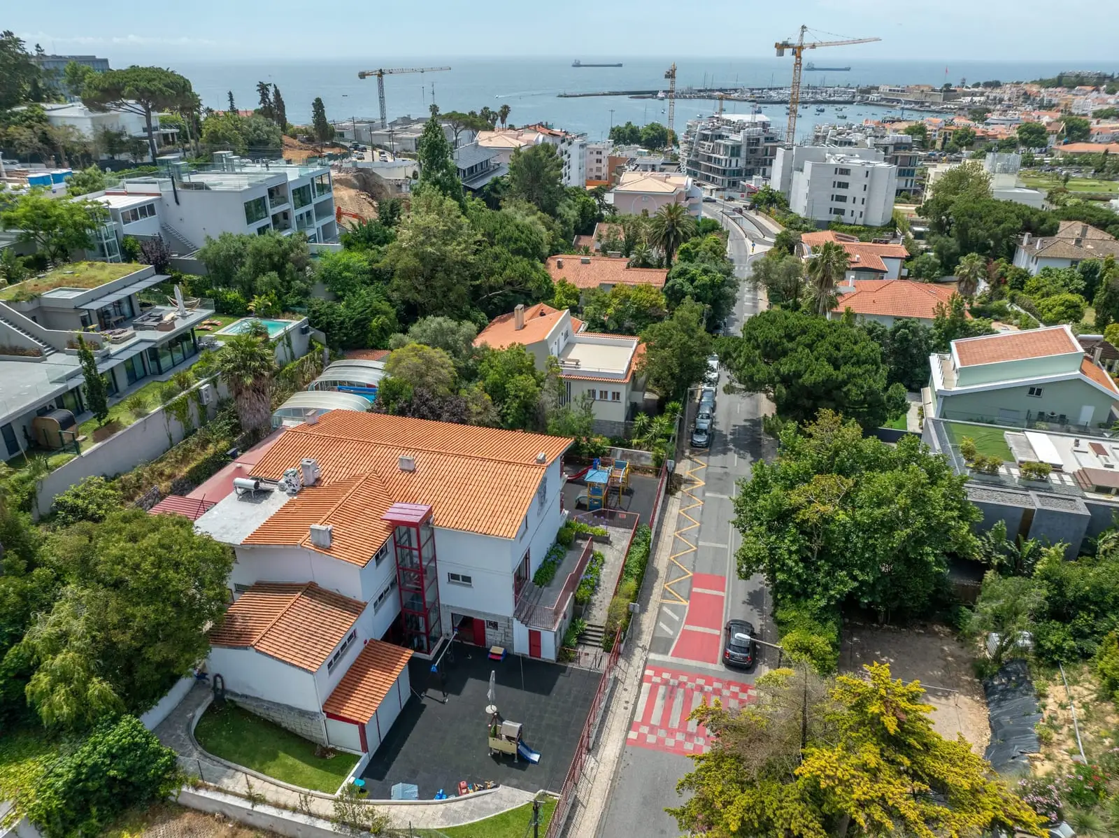 Aerial view of St. John's School and the surrounding streets of Cascais