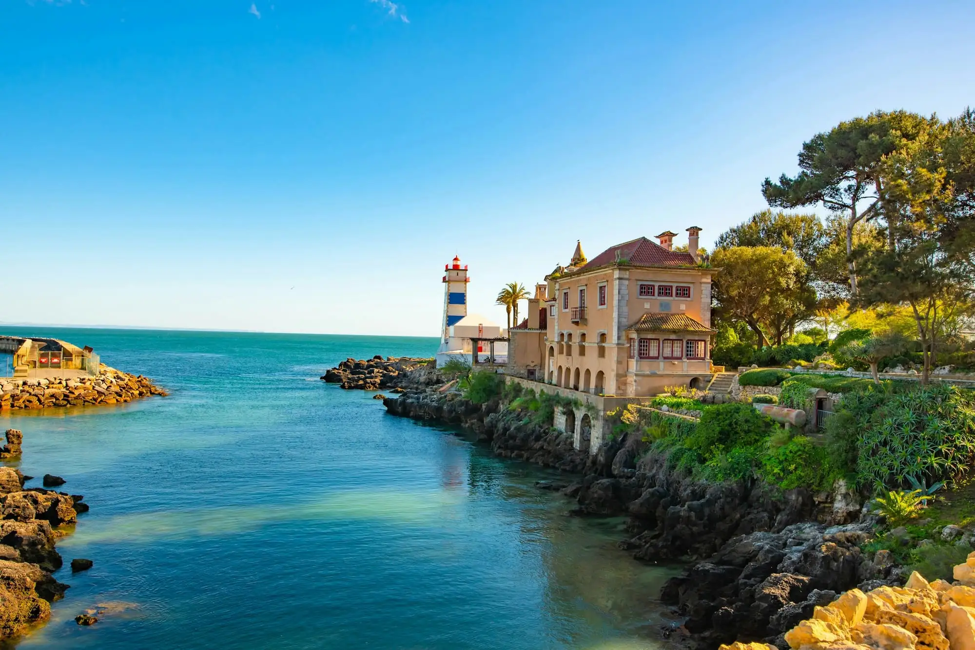 The Santa Marta lighthouse and the rocky shoreline of Cascais